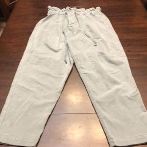 Super cute button fly ruffle top pants.  Size s.